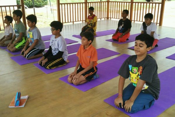 Primary School students in the Yoga room